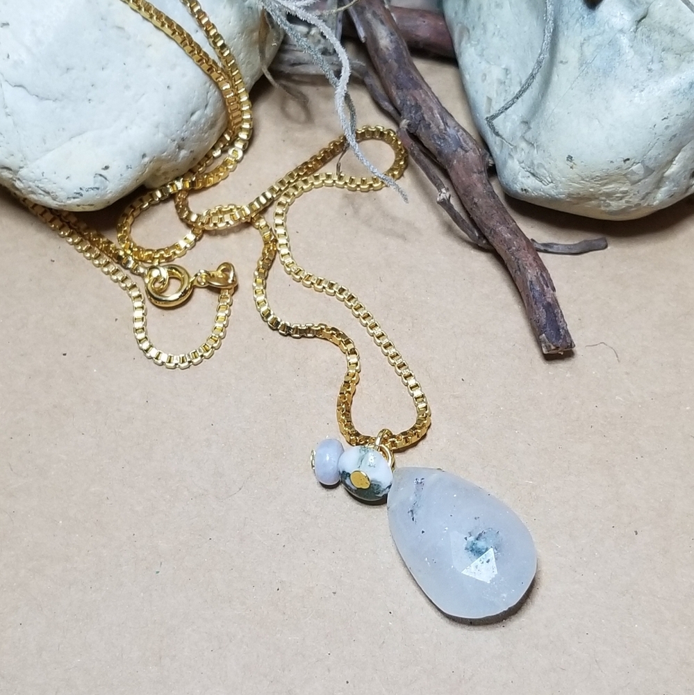 Solar quartz and gold necklace